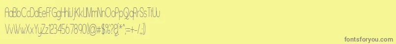 フォントAsenst – 黄色の背景に灰色の文字