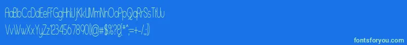 Czcionka Asenst – zielone czcionki na niebieskim tle