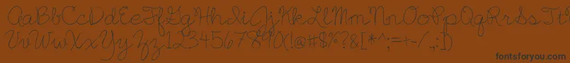 EnglishEssay Font – Black Fonts on Brown Background