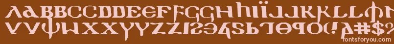 Holyv2e-fontti – vaaleanpunaiset fontit ruskealla taustalla