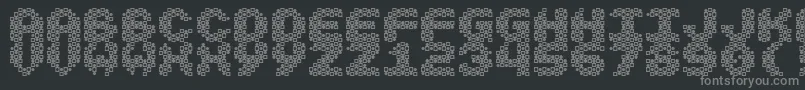フォントVasarely – 黒い背景に灰色の文字