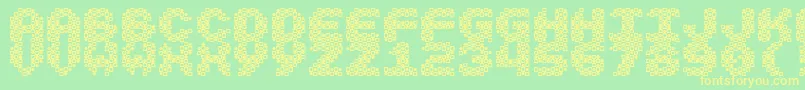 Vasarely Font – Yellow Fonts on Green Background