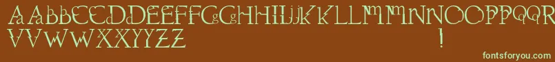 フォントDawnland.Dissonus – 緑色の文字が茶色の背景にあります。