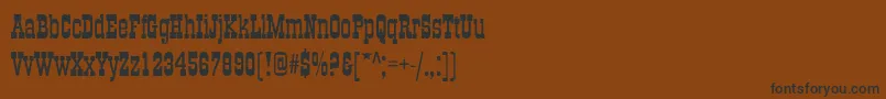 フォントBigbossy – 黒い文字が茶色の背景にあります