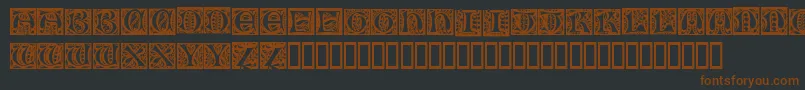 NouveauDropCaps-fontti – ruskeat fontit mustalla taustalla