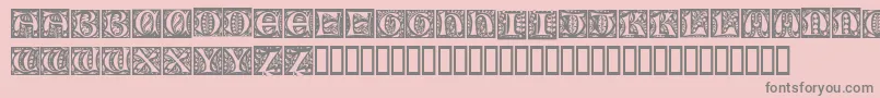 Fonte NouveauDropCaps – fontes cinzas em um fundo rosa