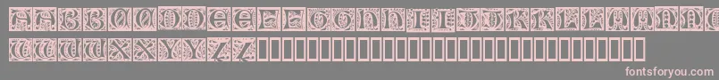NouveauDropCaps Font – Pink Fonts on Gray Background