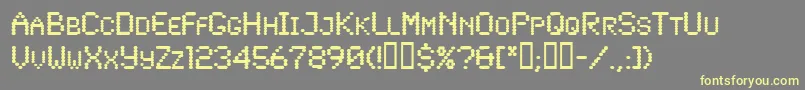 Lowtech Font – Yellow Fonts on Gray Background