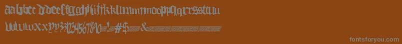 Thuglovedt Font – Gray Fonts on Brown Background