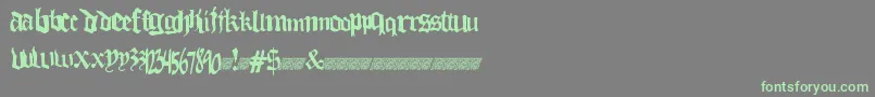 Thuglovedt-Schriftart – Grüne Schriften auf grauem Hintergrund