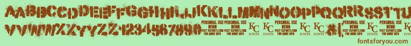 Шрифт MisdemeanordemoKcfonts – коричневые шрифты на зелёном фоне