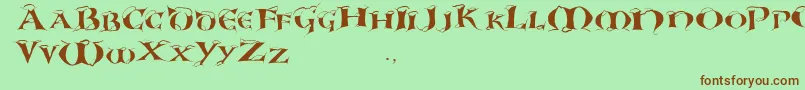 Snowcupscaps Font – Brown Fonts on Green Background