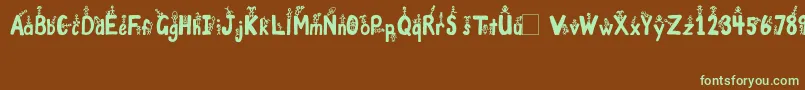 フォントGirlsNBoys – 緑色の文字が茶色の背景にあります。