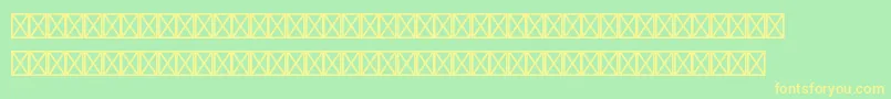 GiddyupstdThangs Font – Yellow Fonts on Green Background