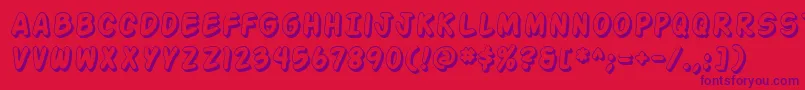 ActionManShaded Font – Purple Fonts on Red Background