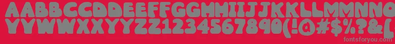 Wobbles1-Schriftart – Graue Schriften auf rotem Hintergrund