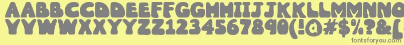 Wobbles1-Schriftart – Graue Schriften auf gelbem Hintergrund