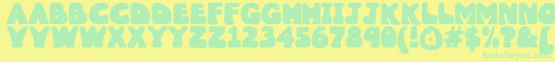Wobbles1-Schriftart – Grüne Schriften auf gelbem Hintergrund