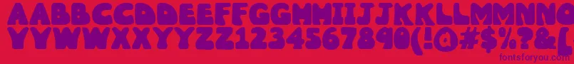 Wobbles1 Font – Purple Fonts on Red Background