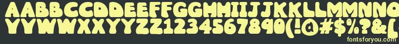 Wobbles1 Font – Yellow Fonts on Black Background