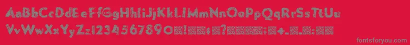 Forgemelt-Schriftart – Graue Schriften auf rotem Hintergrund
