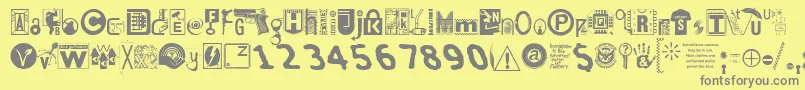 フォントInsecuri – 黄色の背景に灰色の文字