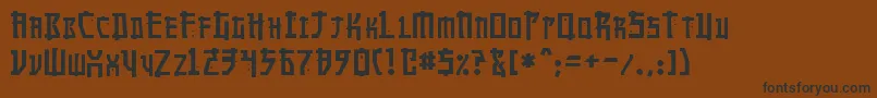 フォントMangaNormal – 黒い文字が茶色の背景にあります