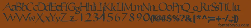 Czcionka Ericbrush21Bold – czarne czcionki na brązowym tle