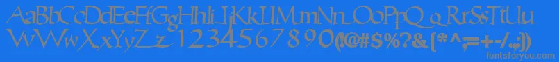 フォントEricbrush21Bold – 青い背景に灰色の文字
