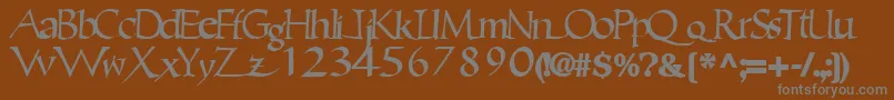 Ericbrush21Bold-fontti – harmaat kirjasimet ruskealla taustalla