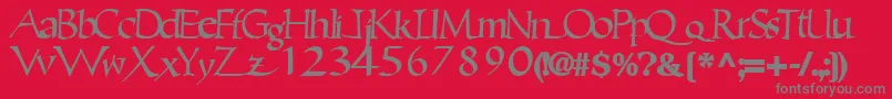 Ericbrush21Bold-fontti – harmaat kirjasimet punaisella taustalla