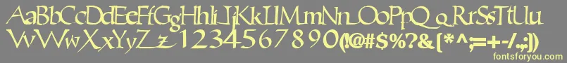 Шрифт Ericbrush21Bold – жёлтые шрифты на сером фоне