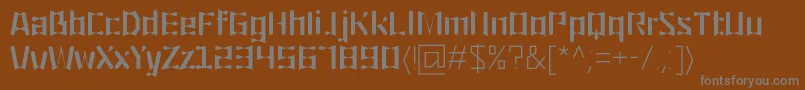 フォントOrigami – 茶色の背景に灰色の文字