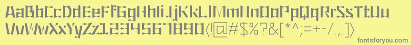 フォントOrigami – 黄色の背景に灰色の文字