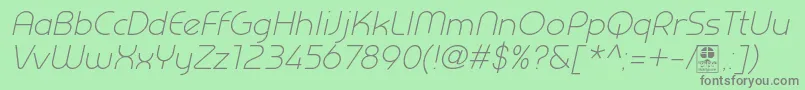 Czcionka PrestijLightItalicDemo – szare czcionki na zielonym tle
