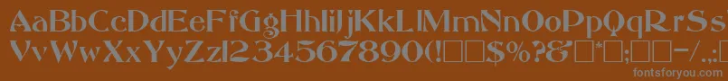 AbbessRegular-fontti – harmaat kirjasimet ruskealla taustalla