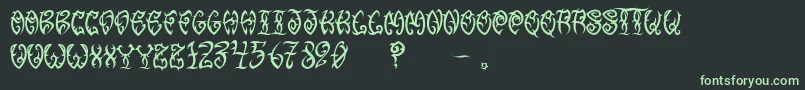 フォントVtcTribalthreefree – 黒い背景に緑の文字