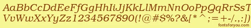 Fonte TextbookLightItalic – fontes marrons em um fundo amarelo