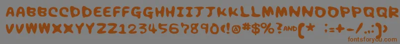 フォントChocolatesyrup – 茶色の文字が灰色の背景にあります。