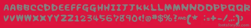 Chocolatesyrup-Schriftart – Graue Schriften auf rotem Hintergrund