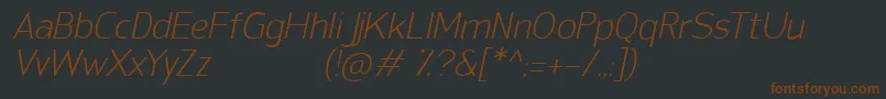 SanFredianoLightItalic-fontti – ruskeat fontit mustalla taustalla