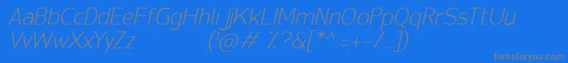SanFredianoLightItalic-Schriftart – Graue Schriften auf blauem Hintergrund