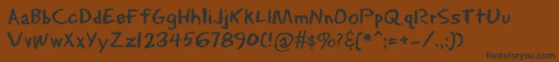 Eraserdust Font – Black Fonts on Brown Background