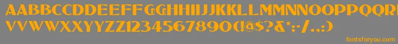 フォントTucsontwo – オレンジの文字は灰色の背景にあります。