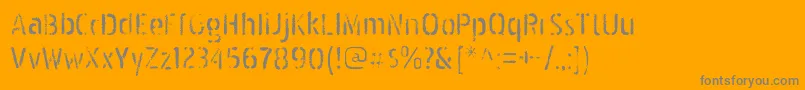 PakenhamspraypaintRegular-Schriftart – Graue Schriften auf orangefarbenem Hintergrund