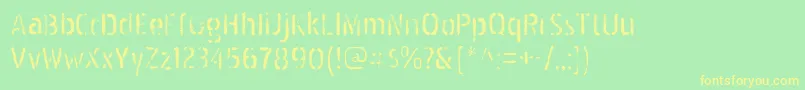 PakenhamspraypaintRegular Font – Yellow Fonts on Green Background