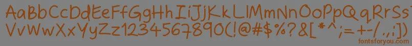 Zakirahshand Font – Brown Fonts on Gray Background