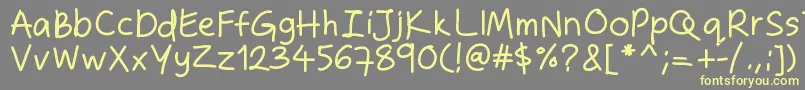 Zakirahshand Font – Yellow Fonts on Gray Background