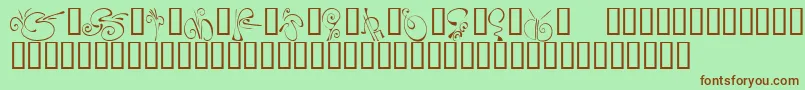 Шрифт KrFleurFlair5 – коричневые шрифты на зелёном фоне