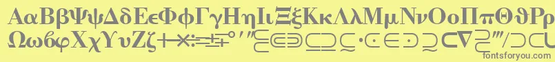 フォントQuantapitwossk – 黄色の背景に灰色の文字